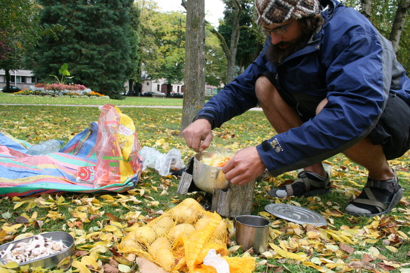 France, Epinal - Jim cooking potato veg soup in the park!