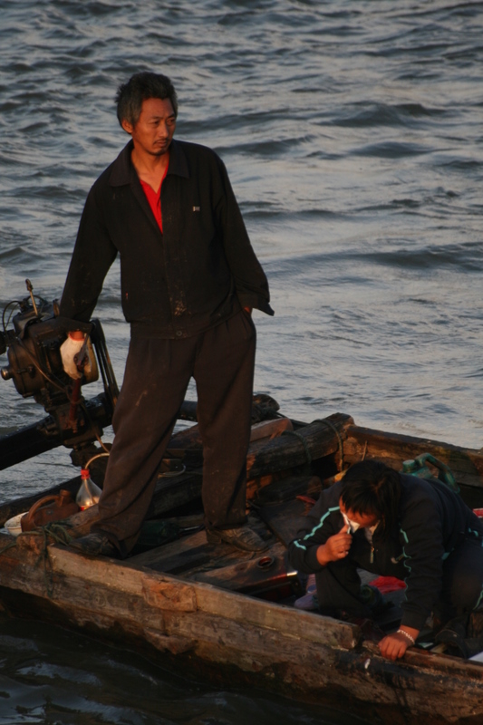 Oct 9 2007 - Changrong village, Jiangsu Prov, China. Morning. Boating and brushing teeth.