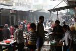 China, Meihua town - Jim and Nakia buying breakfast at a morning market