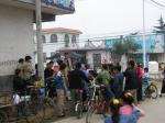 China - Jim chatting with a street crowd