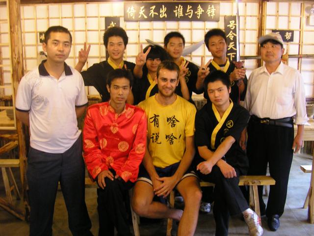 China, Shuyang - Peter with a new restaurant's staff on its grand opening