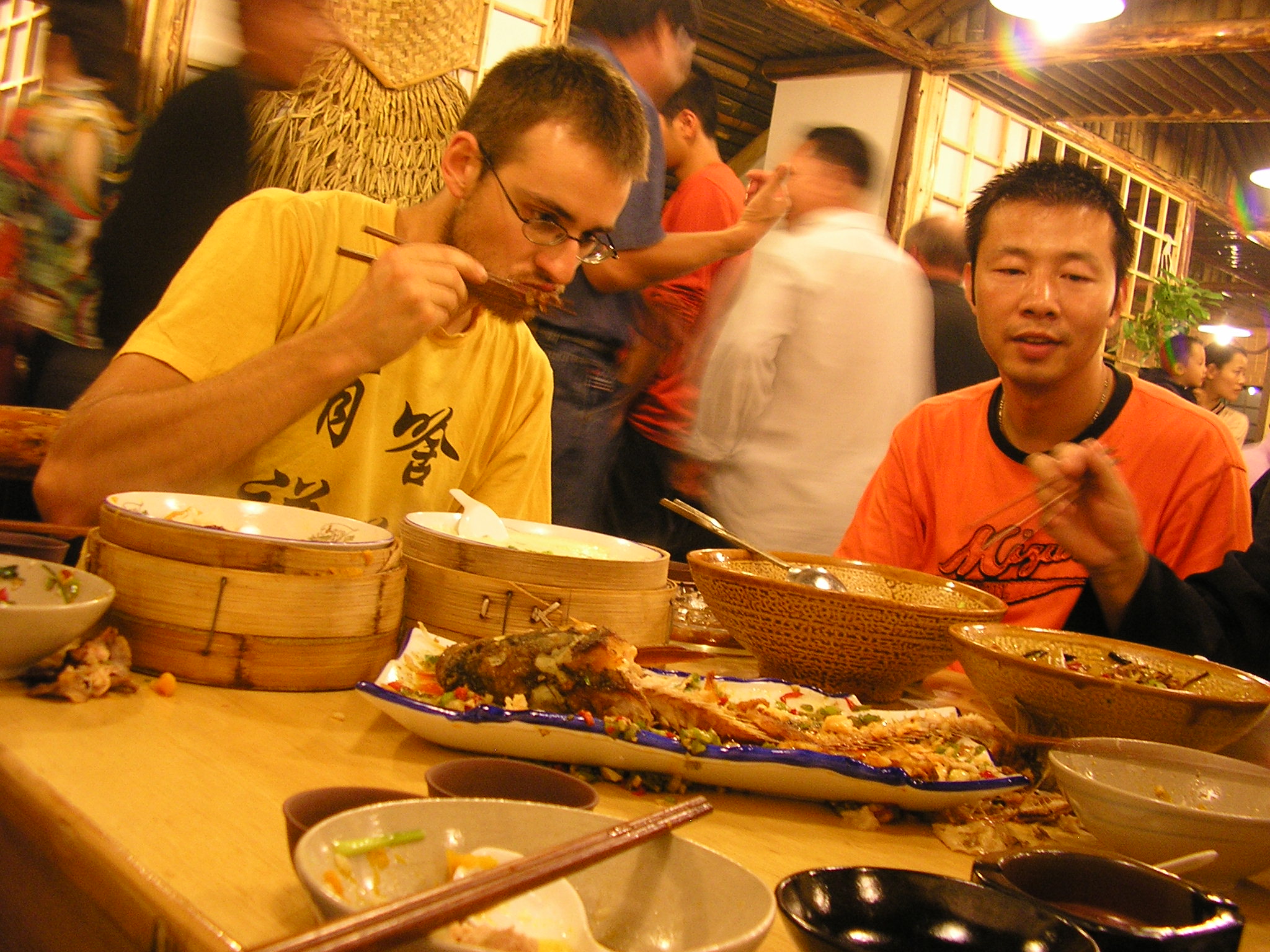 China, Shuyang - Peter with a new restaurant's owner on its grand opening. He generously gave us all a free dinner, gormet ancie