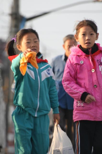 Oct 9 2007 - Changrong village, Jiangsu Prov, China. Morning on the street. On the way to school.