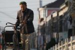 Oct 9 2007 - Changrong village, Jiangsu Prov, China. Morning on the street.