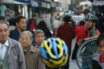 China, Suzhou Oct 10 2007 - On the streets of Suzhou, people take notice