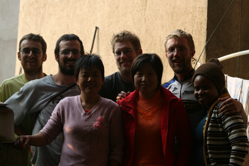 Oct 23 2007 - Mrs. Zhang, her assistant, and fueledbyrice in her open air kitchen