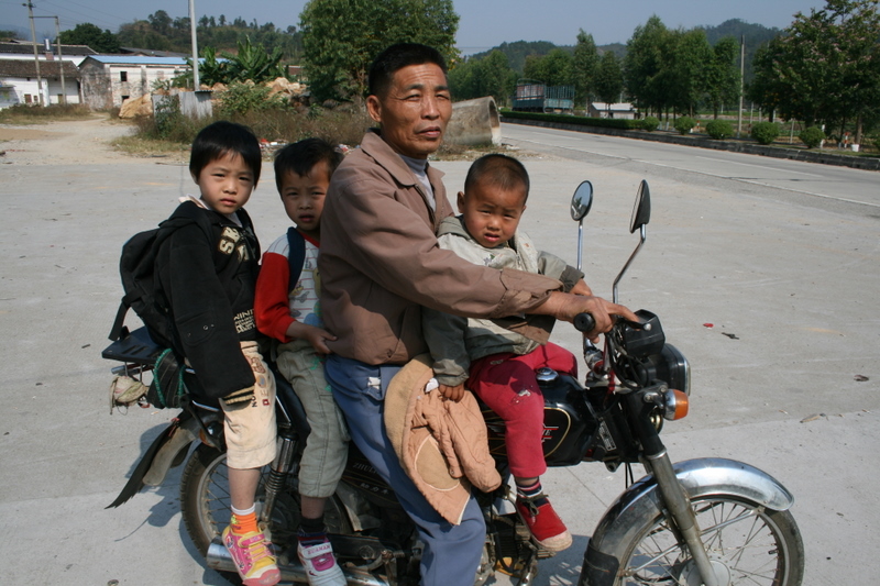 3,4,5 on a motorbike is not uncommon in China.