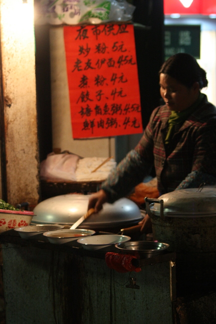 China, Shangsi - A woman making Jiaozi whom we freaquented during our Christmas break