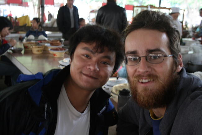 China, Pingxiang border town.  This young fellow traveler, 28, befriended me one evening at a Vietnamese street stall. After cha