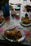 Vietnam - Fried rice with new Vietnamese condiments: vinegar with garlic and hot peppers, limes, and fish sauce.