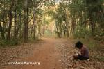 Lao - Nakia reading in the morning by our campsite