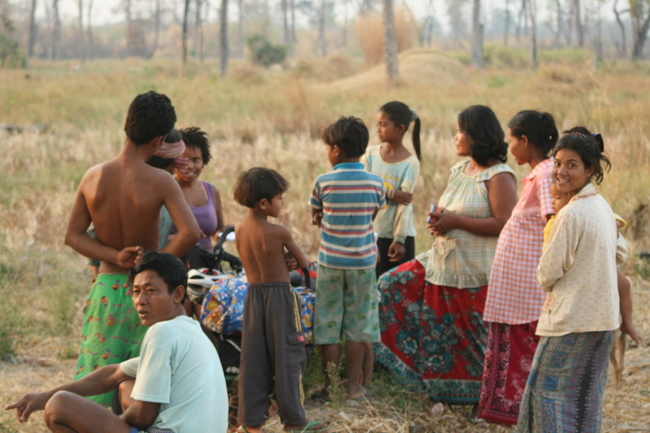 Cambodia - camping in back of family Sre's house was quite social as the neighbors all stopped by to say hi.