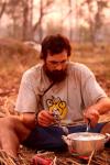 Cambodia - Jim cooking rice with his stove for one of the first times, but now has become habit.