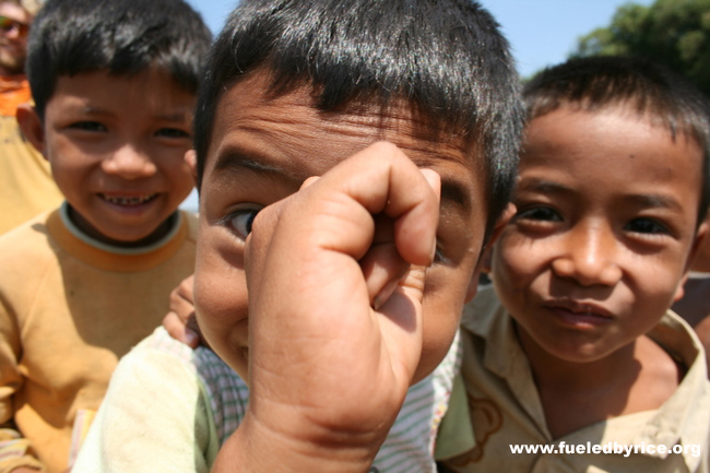 Cambodia - kids at a local Mekong River ferry boat crossing. 