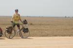 Cambodia - flattness and dead.  A baren wastland of dry rice fields on the way to the Thai border.