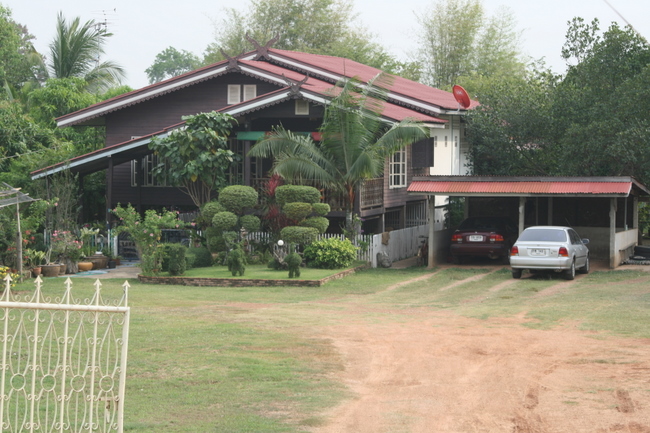 Thailand - Whoa.  Middle class Thai house. Huge contrast in socio-economic level between developed Thailand and developing Cambo