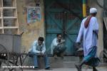 India, Kolcatta - Crowded, people live their lives in the street in Calcutta.