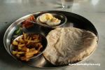 India - An Indian Breakfast - Chapati, egg, and potato mix