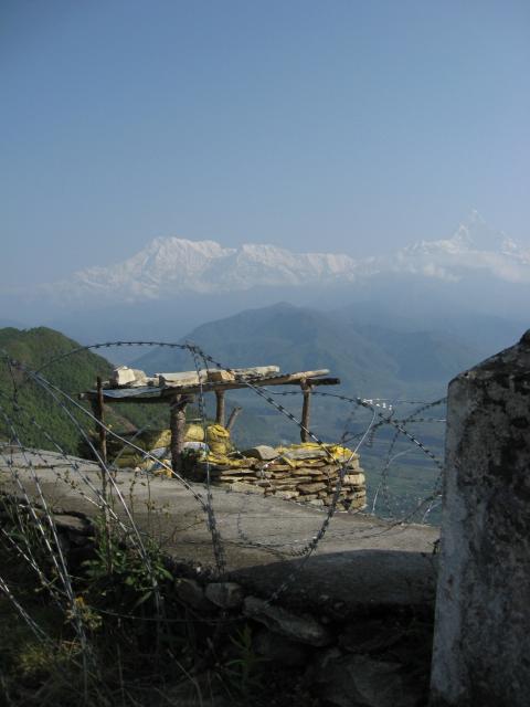 barbed wire and snow mountains