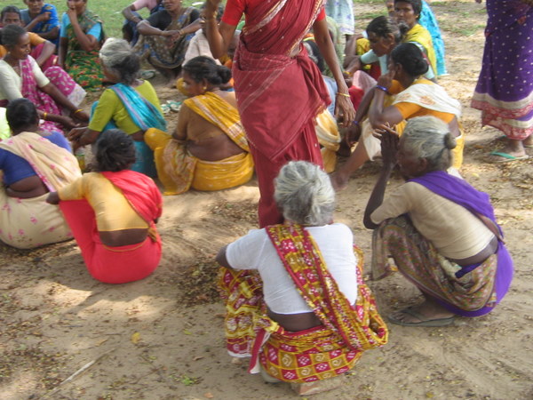 Women panchayat board members gather to attend a meeting.