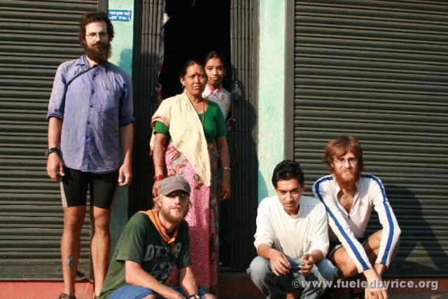 Nepal, just west of Pokhara - With our host family for an evening in front of their house. Janga Bahadur, the young man next to