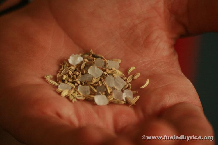 India, West Bengal - A common breath freshener given after meals in India, a licorice-tasting seed with big sugar crystals. 