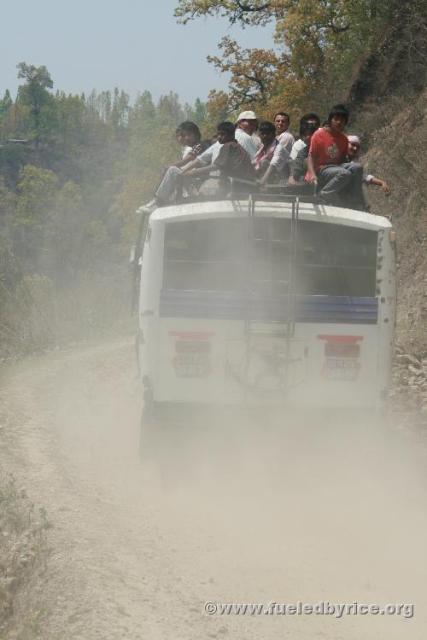 Nepal, Himalayan foothills, road to Sindhuligati - Somehow these huge buses still run on this small, single-lane dirt road to Si