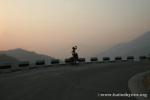 Nepal, Himalayan foothills, road to Sindhuligati - Water break! On the Japanese-built road at dusk, my favorite time of day.