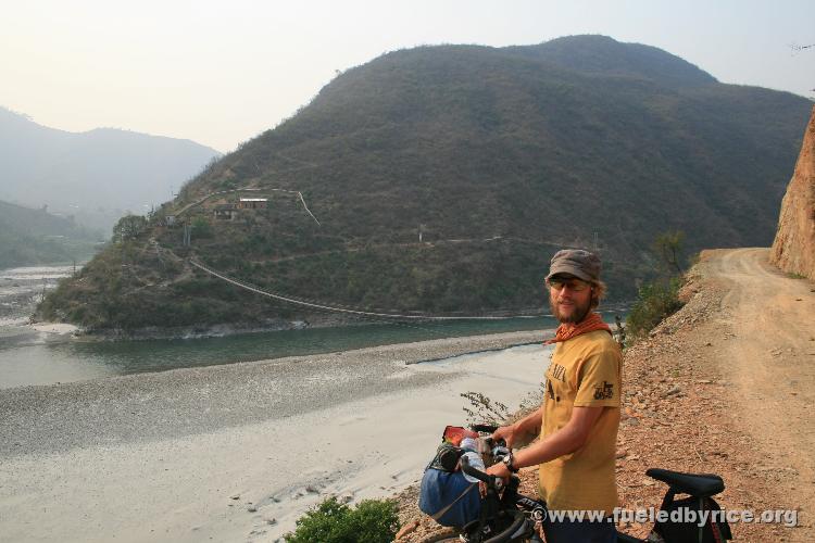 Nepal, Himalayan foothills, Sindhuli area - Andrew on our back rocky-middle-of-nowhere-Nepal-back-way-to-Kathmandu-road. No, we 