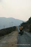 Nepal, Himalayan foothills, Jiri road - Drew and Jim climbing another long up on our backroad to Kathmandu