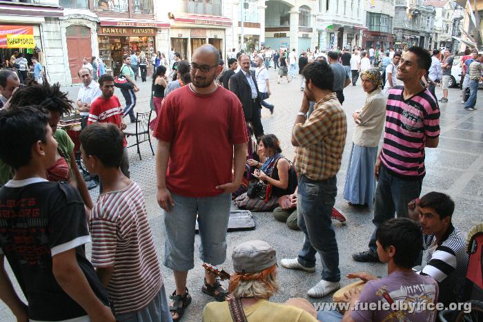 Türkiye, İstanbul, Taxim - Looking out from our performance spot on Turkey's most famous and busy street, İstiklal Caddesi