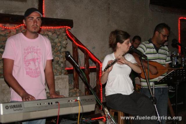 Türkiye, Edirme - The owners of the Cadde Cafe, middle and far R, play traditional Türkish music.