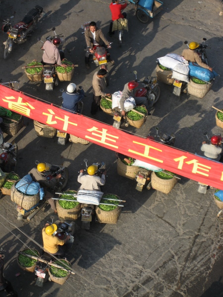 China - Heading to market with vegetables. (Adam)