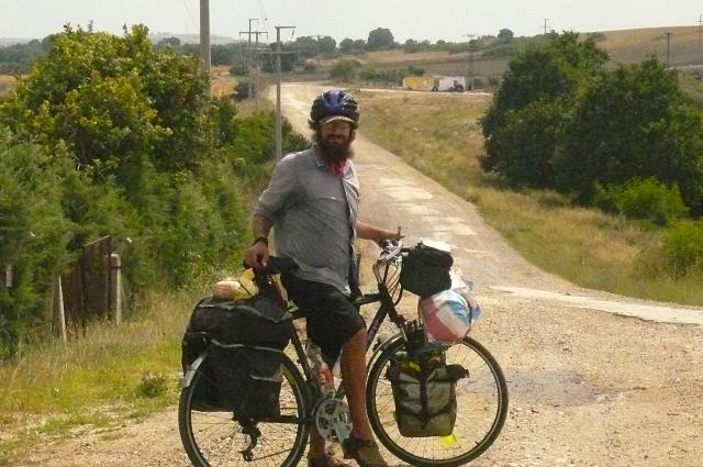 Jim on  another isolated road while he and I were riding to meet Autumn and Jay in Bulgaria.