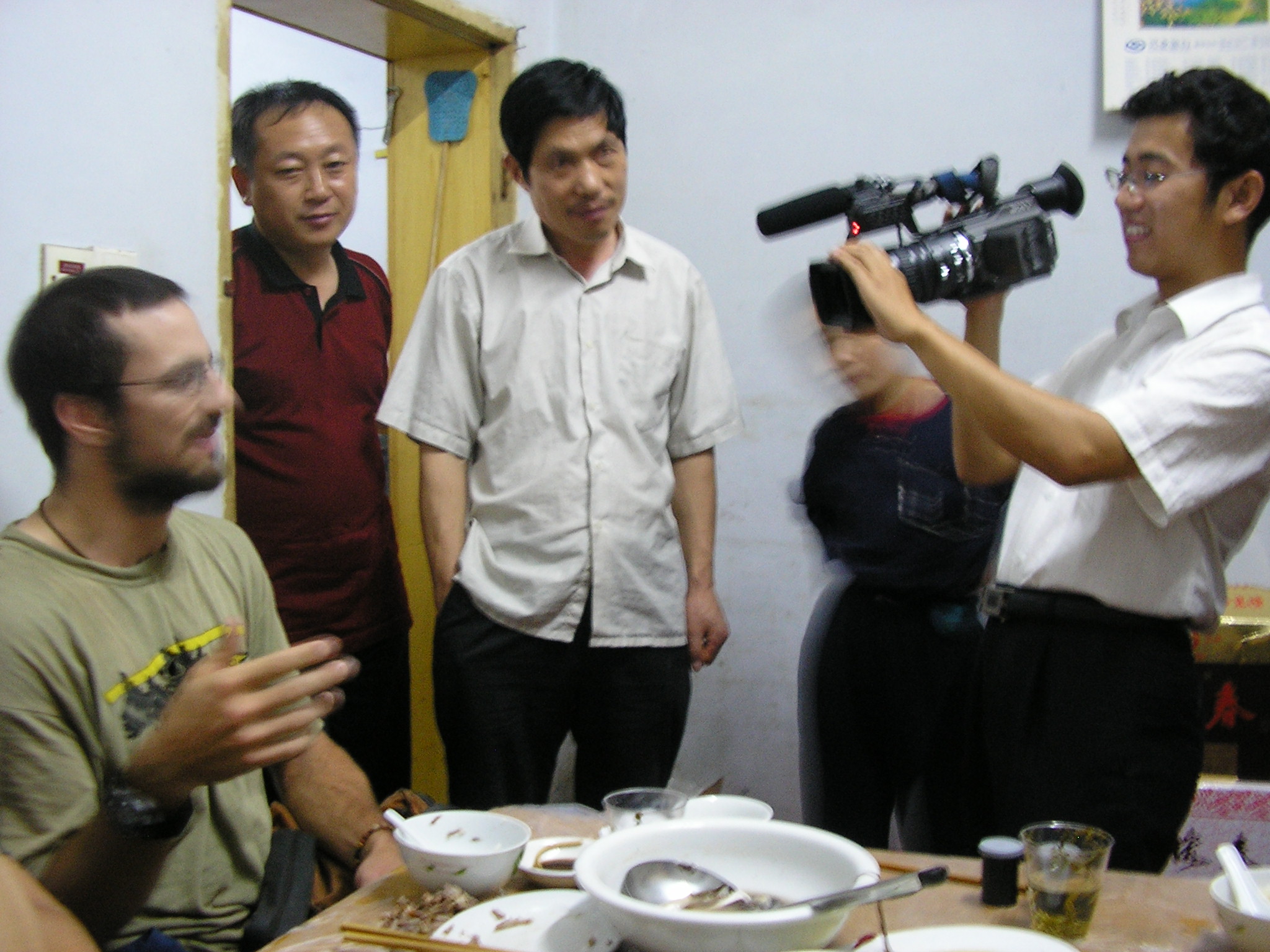 Oct 5 2007 - Shuyang, Jiangsu.  A local TV news reporter heard we were eating (on the house) in this little restaurant.  He said