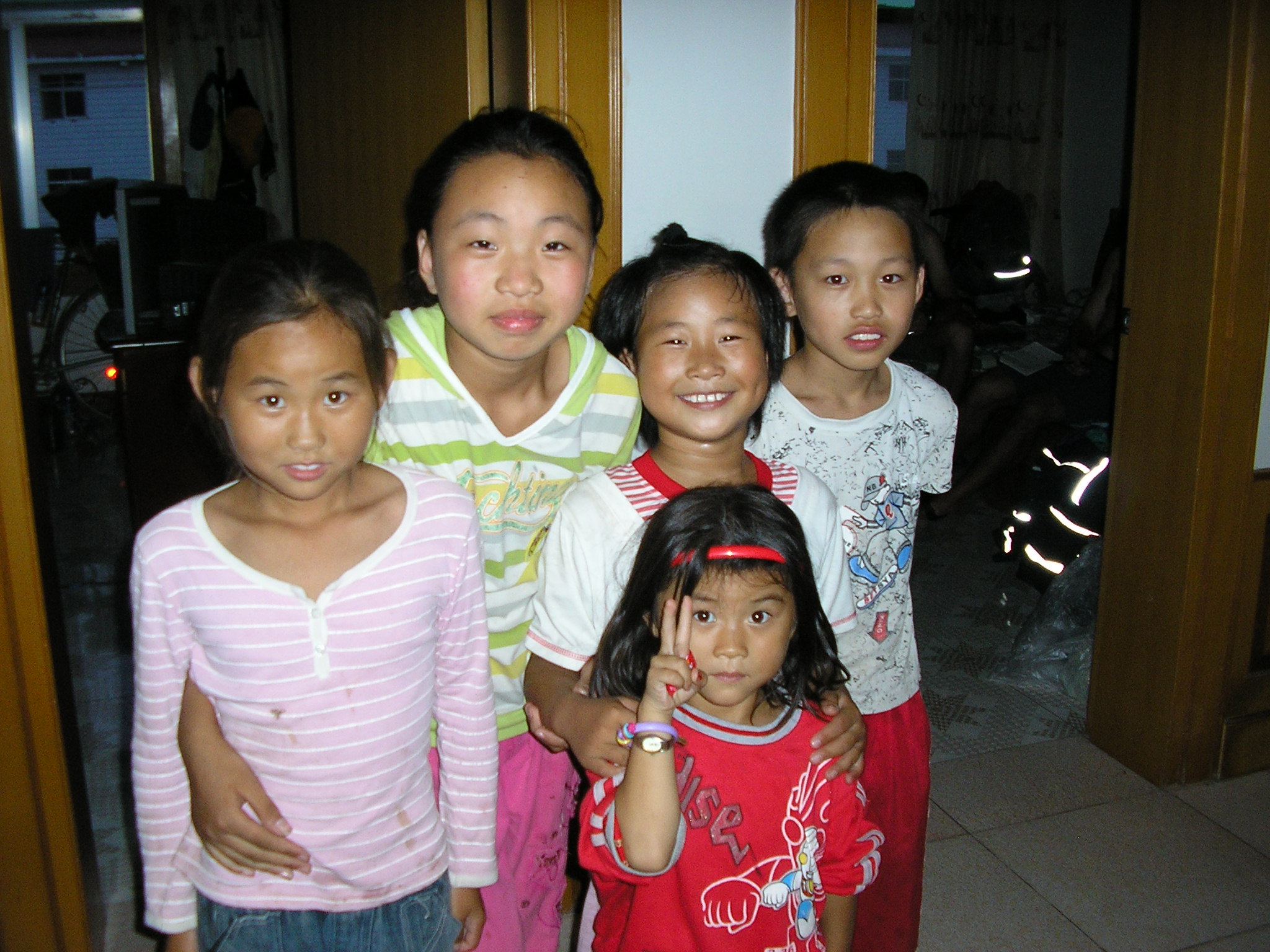 Oct 6 2007 - Part of the welcoming crowd - Local kids come up to check us out in Lianshui, Jiangsu.