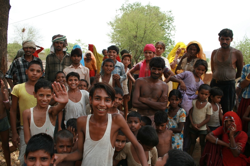 India, Rajistani village - We stopped to ask for the nearest market in the midday heat, and they warmly welcomed us to stop and 