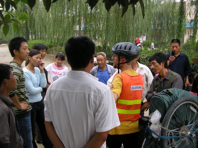 China - Drew chatting with a street crowd
