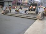 China - Laying new concrete road...excellent for bicycle touring!   (Peter)