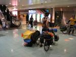 China, Hong Kong - Walking our bikes through the mall to the ferry to Zhu Hai city, China Mainland