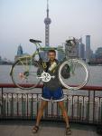 Shanghai - Peter in front of the famous Pearl of the Orient TV tower.  The Forrest (Green Giant) made it, and is still running s