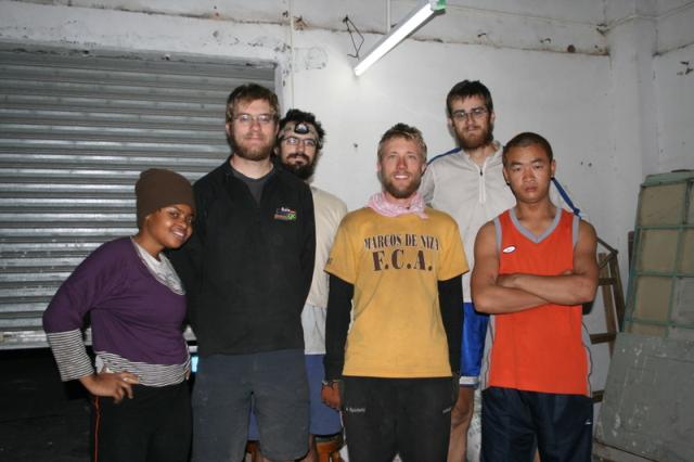 China, Shenzhen - Zhou and us in his garage apartment, where he graciously hosted us for free upon asking him where a cheap hote