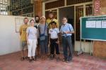 Cambodia, Phnom Penh - With Peter's friend, Celina, and our new friend, Fr. Charlie, at their Maryknoll project working with the