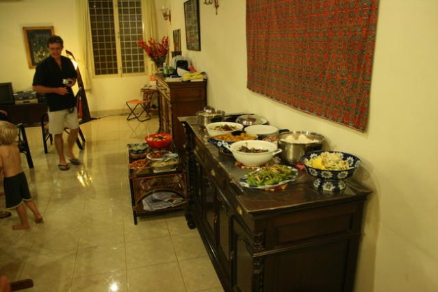 Cambodia, Phnom Penh - The finished product of our efforts: a Chinese/Japanese/fusion dinner, buffet style. Jean-Francoise in ba
