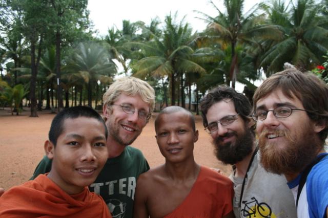 Cambodia - With two Buddhist monk friends at a monastery we stayed at enroute to Siem Reap.  The monk in the middle is named Soc