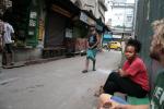 India, Kolcatta - Nakia and Drew waiting for breakfast on the street