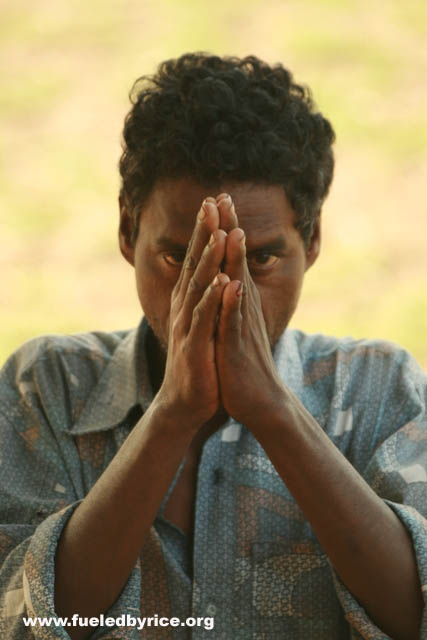 India, West Bengal - One of 3 men along a county road who stopped me and asked me to take their photo.