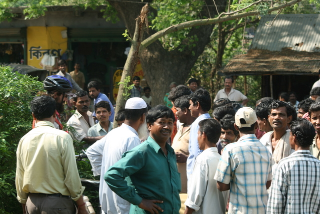 India, West Bengal - Jim talking to one of many crowds that, like China, seem to gather around us when ever we stop.  The people