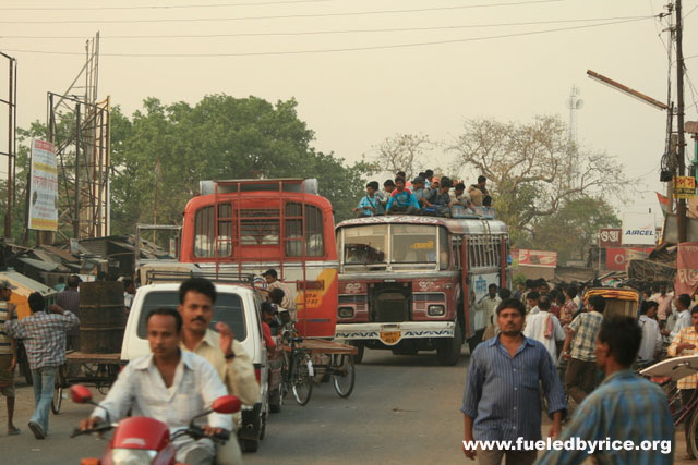 India, West Bengal - Entering a mid-sized market town by its bus station = busy traffic!