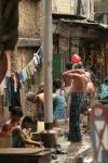 India, Kolcatta - In Kolcatta, its common to see groups of men using free water from spounts on the street to bathe, but never w